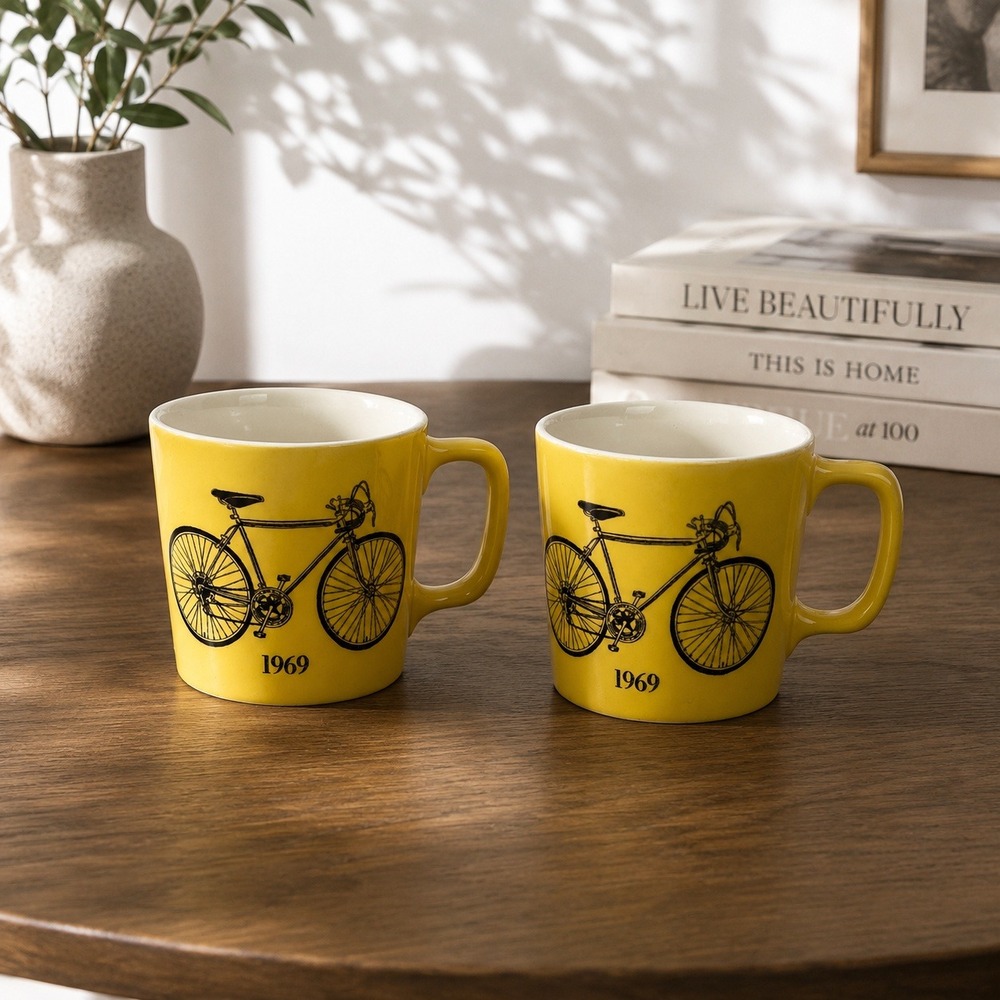 Vintage Style 1969 Bicycle Graphic Coffee Mugs Set of 2 Yellow Ceramic
